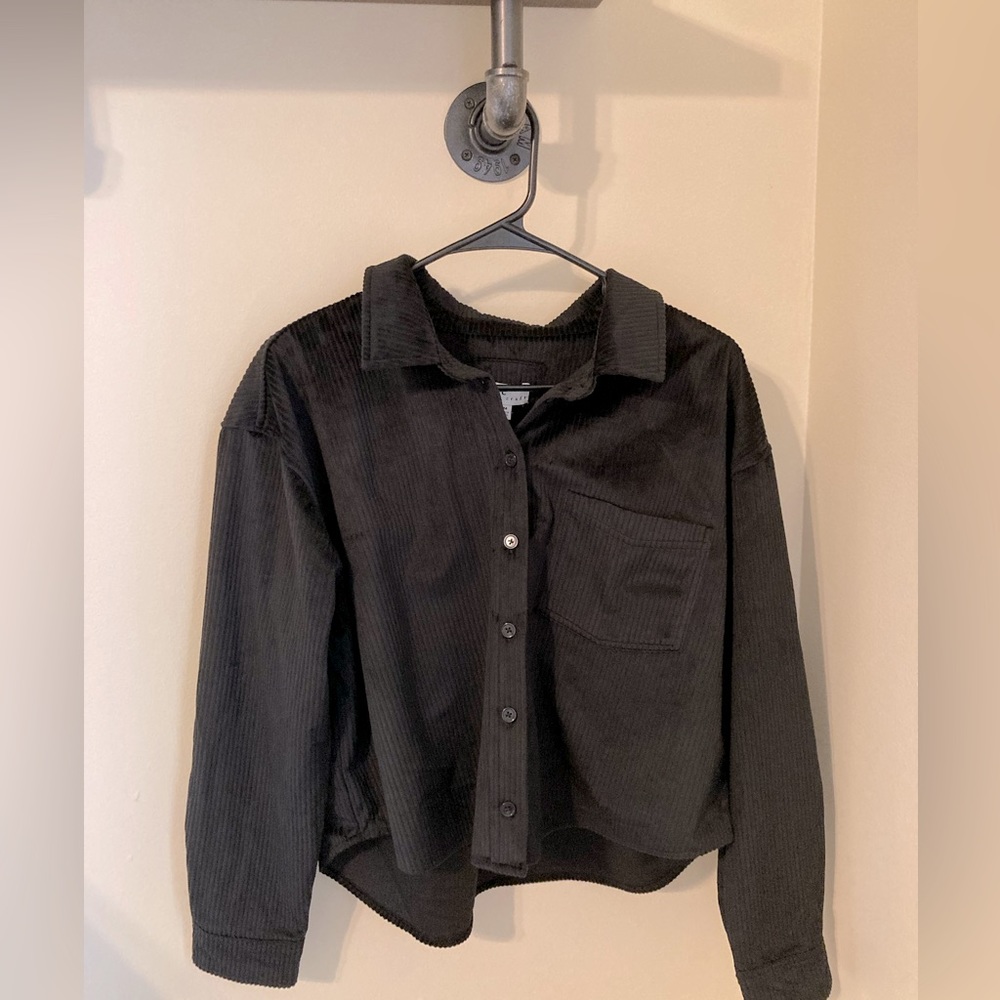 Women’s corduroy, slightly cropped button up.